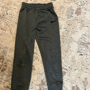 Boys Nike sweatpants, size 7, hole in knee